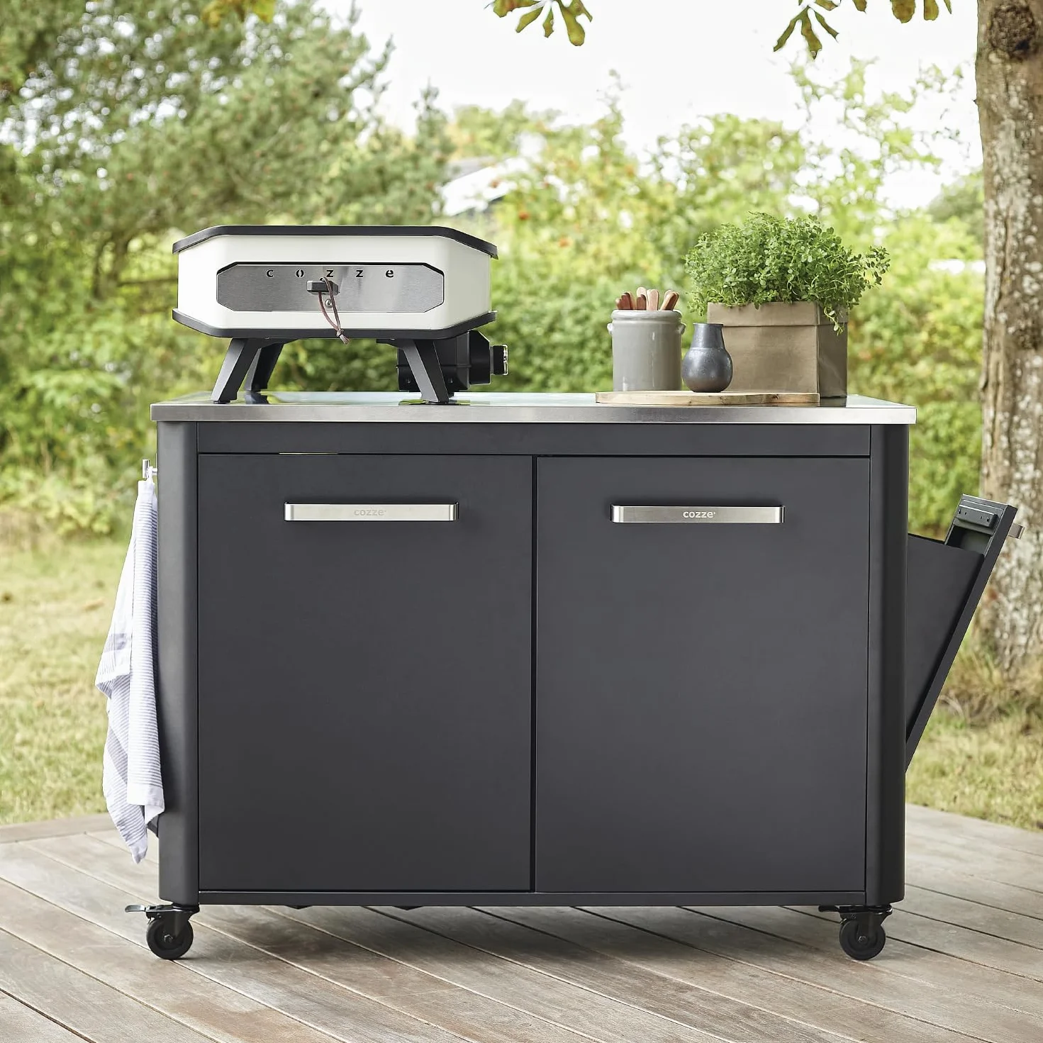 Cozze Mesa de exterior con sobre de acero inoxidable, 2 puertas y 4 ruedas acero inoxidable/negro/gris