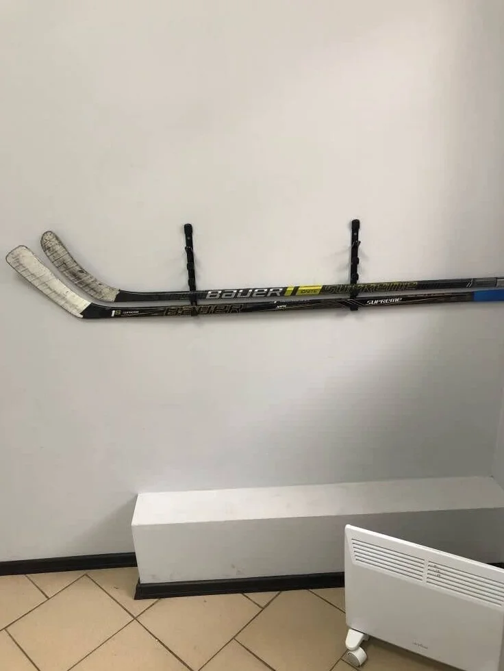 Soporte para palos de hockey, montaje en pared