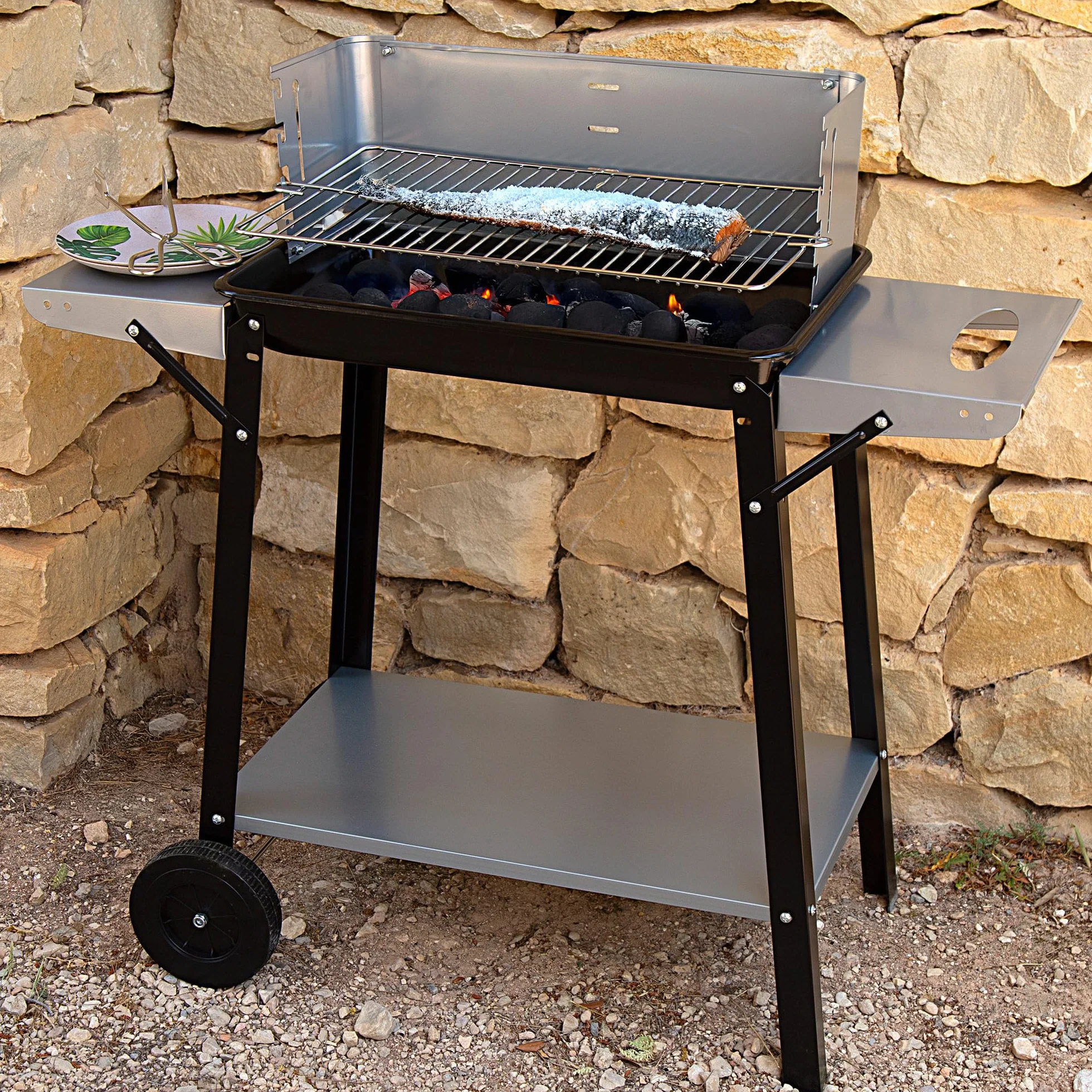 Aktive 52973 - Barbacoa carbón y leña 90x32x85 cm con control de temperatura y dos mangos extraíbles, 4 alturas regulables, 2 ruedas y asa de transporte, Fácil y rápida de montar