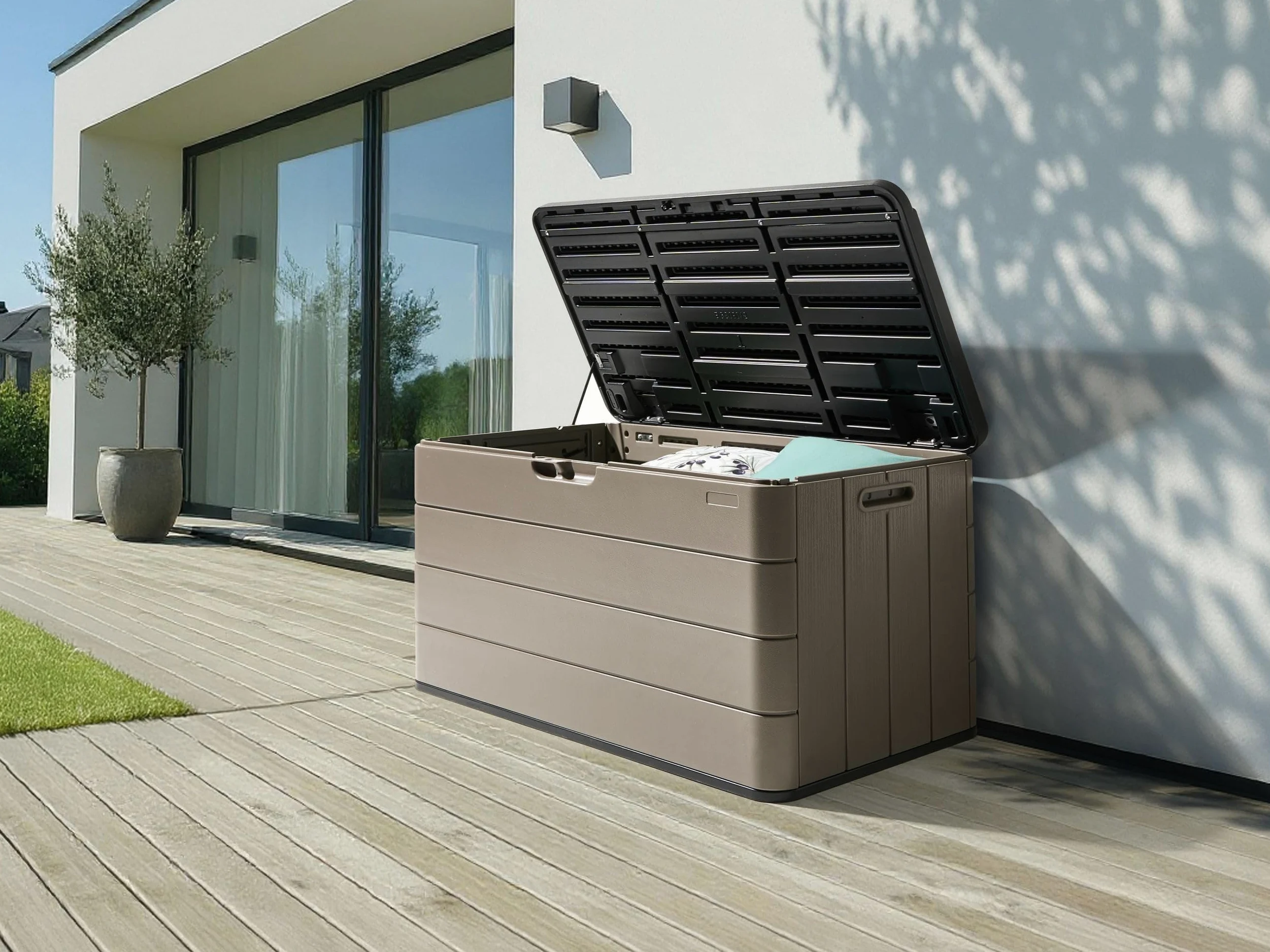 Beliani Arcón para exterior caja de almacenaje de jardín 116 x 60 cm ruedas de plástico marrón Milies